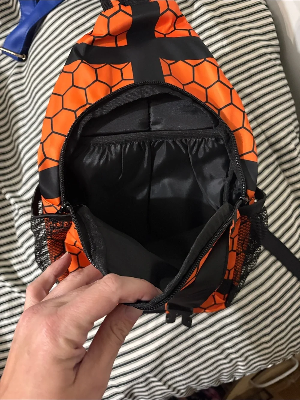 Orange and Black Hex-Pattern Sling Bag